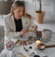 high-angle-woman-reading-tarot-home